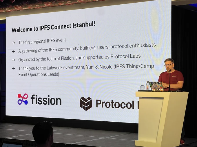 Boris Mann on stage opening the event