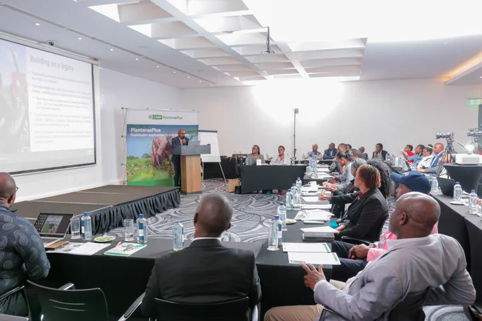 Attendees at the CABI PlantwisePlus high-level stakeholder engagement in Kenya, sat watching a presentation.