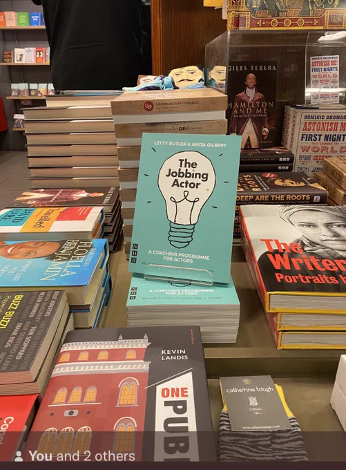 A table of acting inspired books. Centre is placed The Jobbing Actor, A Coaching Programme for Actors. It is a green cover with a lightbulb in the centre, filled with the title.