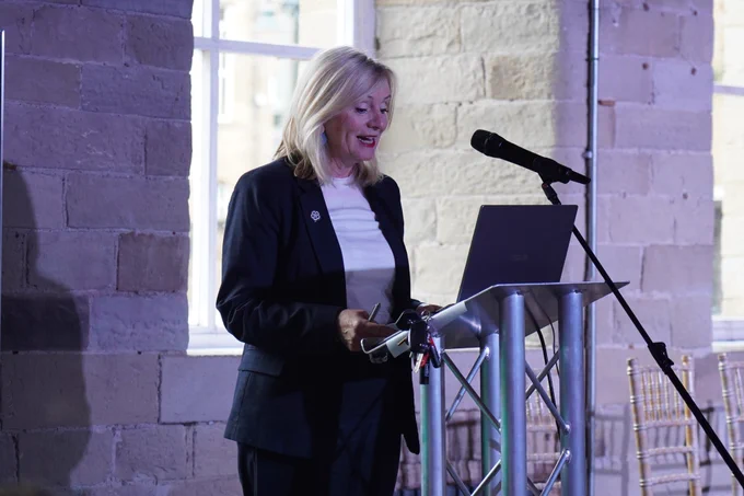 The Mayor of West Yorkshire, Tracy Brabin, is on stage making a speech at the Innovation Festival. 