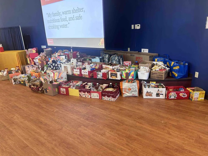 Shows the 62 thanksgiving baskets Thomas community donated.