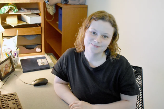 [ID: Pictured is a photo of UTA Libraries staff member Samantha Streeter.]
