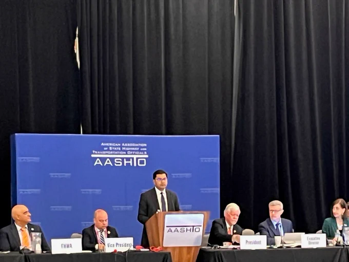 FRA Administrator Amit Bose speaking at the podium. 
