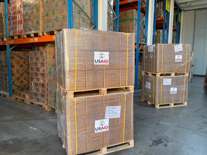 Crates of USAID nutritional food aid to be loaded onto planes.