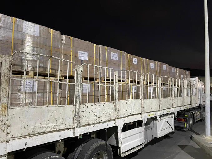 Crates of USAID nutritional food aid to be loaded onto planes.