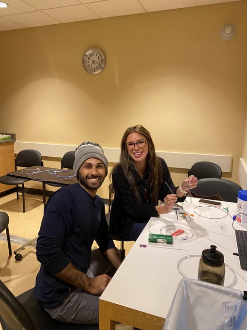PGY-2 resident Moiz and PGY-5 IR expert Ginger reviewing IR equipment