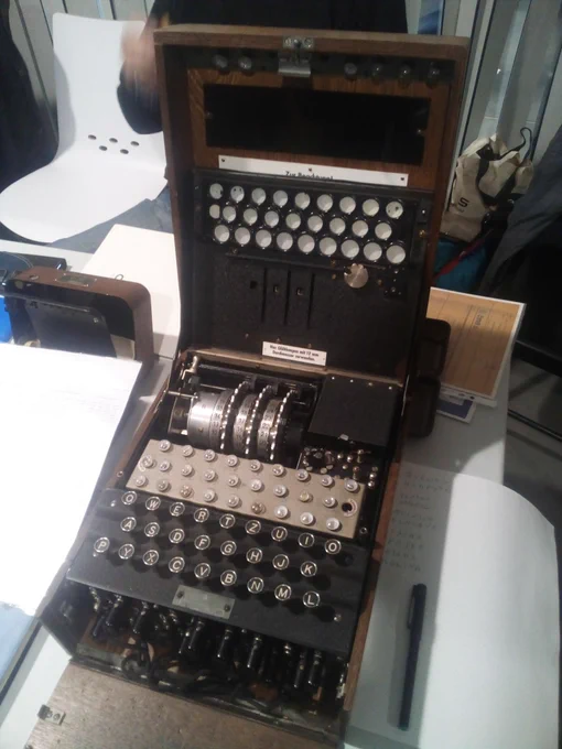 Photography of a working Enigma machine (1942) at the GreHack 2023 conference