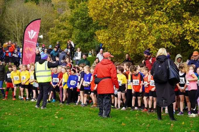 Children in the primary school race on the start line.