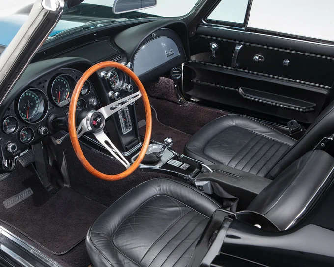This custom 1967 Chevrolet Corvette started life as a factory air-conditioned convertible and since has benefited from a professional, Jerry Clark frame-off restoration with drivetrain. Power comes from a 454ci big-block engine bored 0.30 and stroked to 489ci and equipped with Tri-Power carburetion, Air Flow Research aluminum heads, a Lunati built and balanced rotating assembly, Lunati hydraulic roller cam and MSD ignition. The engine makes a dyno-tested 655hp with 590 ft./lbs of torque. The engine is mated to a Keisler 5-speed manual transmission. Spent gases exit through a set of Hedman headers with a side-pipe exhaust. Other upgrades include stainless-steel brake lines, oversized half-shafts, oversized calipers, heavy-duty sway bars, high-performance shocks and Dynamat heat- and sound-deadening. The exterior bodywork and paint were done by renowned J&M Corvette Auto Body in Brooksvill, FL. 