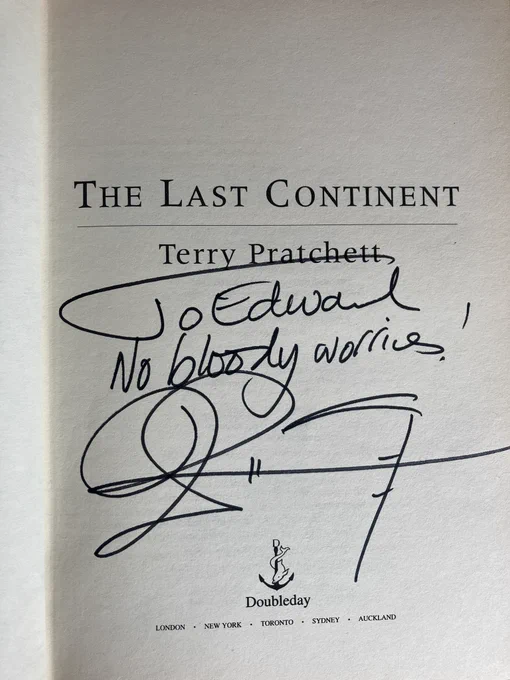 The title page from Terry Pratchett’s The Last Continent, signed by the author “To Edward, No bloody worries”