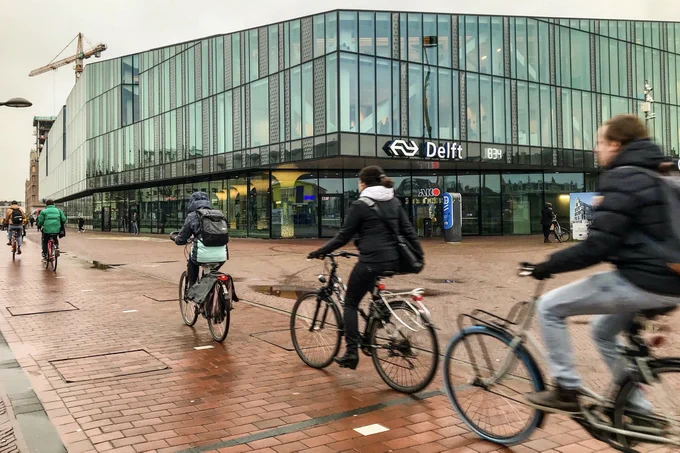 Cyclists by Delft Station
