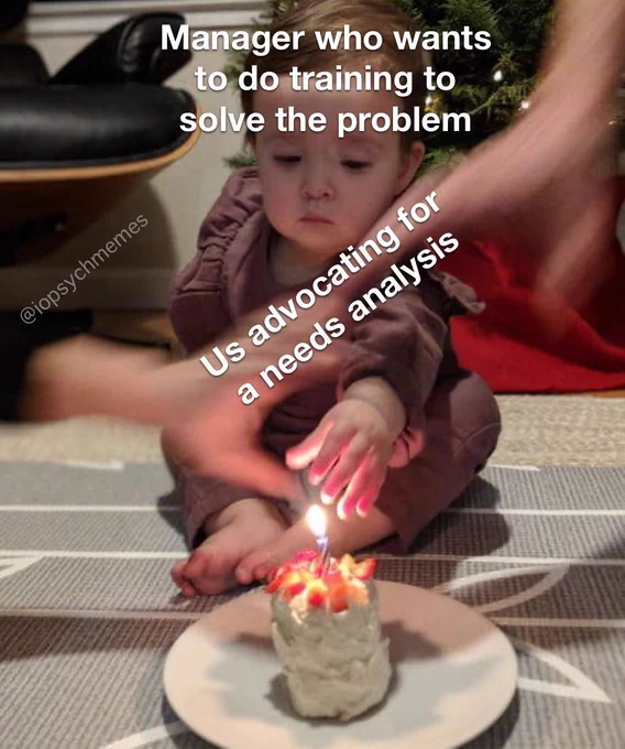 Baby reaching for flame and parents reaching for the baby’s hand
