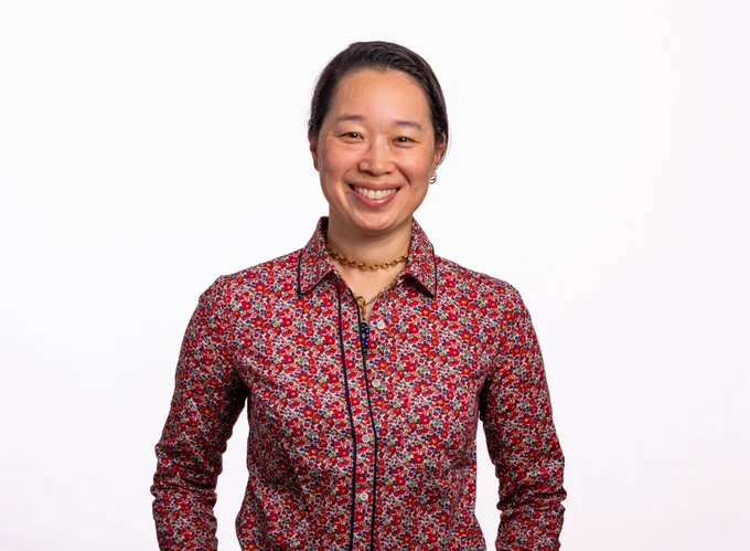 Full-color portrait of Professor Michelle Chang against a white background.