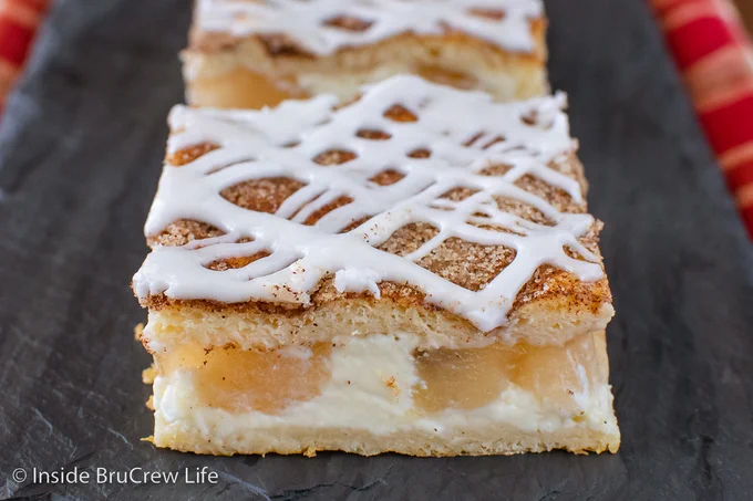 A cream cheese bar made with apple fruit filling.