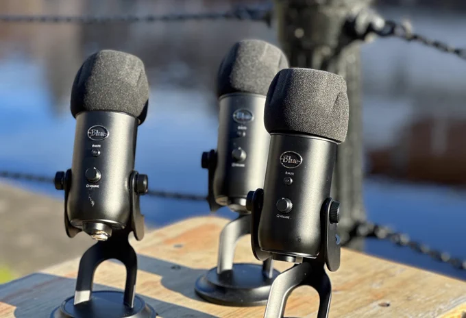 Three podcast microphones on the shore in Leith