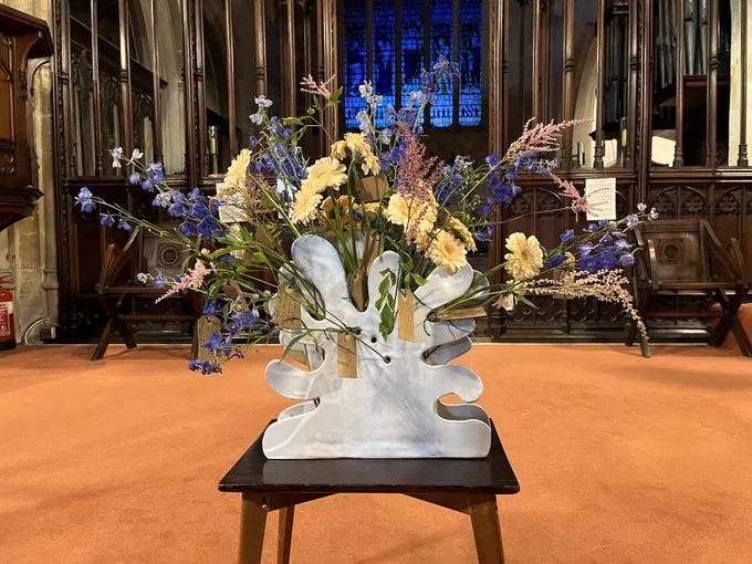 Floral Tribute in a specially designed pottery vase