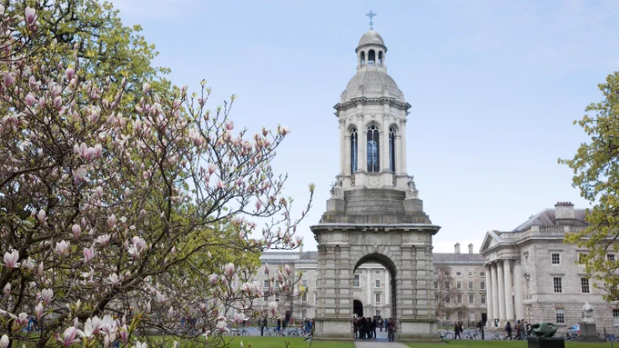 An image of the Trinity Campanile with trees in the foreground