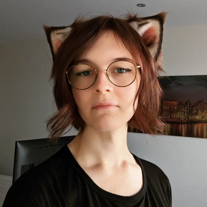 selfie showing Freya's new haircut (and cat ears)