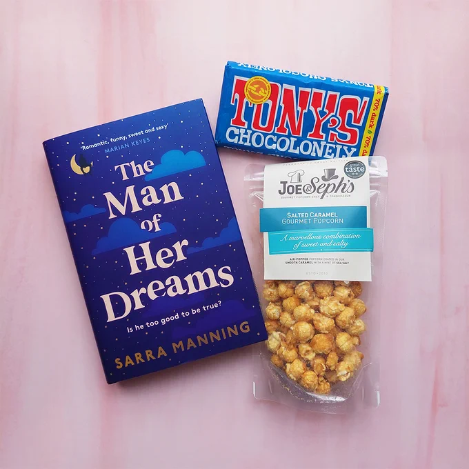 image of The Man of Her Dreams prize draw items: book, chocolate bar, popcorn
