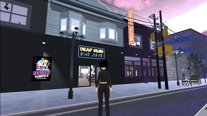 On a street in a virtual world, an avatar is seen from behind standing at the entrance to a Deaf Club.

View of Melissa Malzkuhn's "Deaf Club," 2023