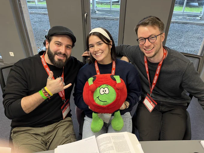 Paxi enjoying the company of a students' team