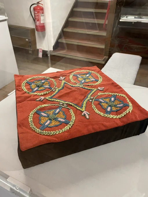 An embroidered cushion cover from the Edinburgh College of Domestic Science