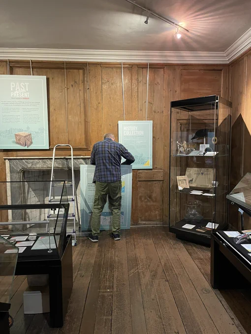 Installing exhibition panels at the Museum of Edinburgh