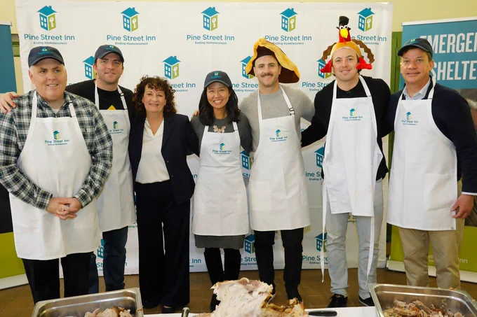 Boston City Council President Ed Flynn, Boston City Councilor for District 3 John FitzGerald, Lyndia Downie, Mayor Wu, Kevin Shattenkirk, Charlie McAvoy and State Representative John Moran. Photo by John Rich.