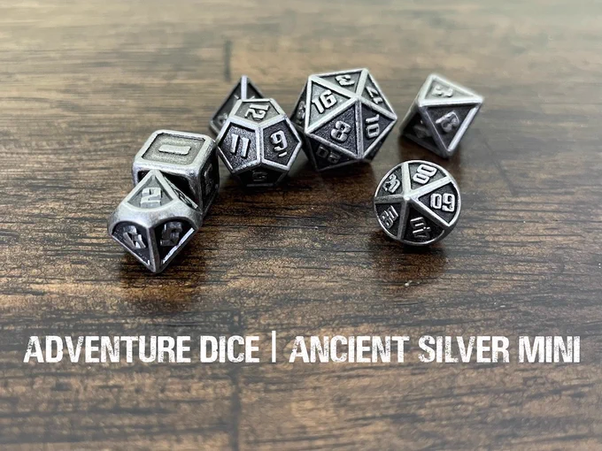 Ancient Silver mini metal dice set are a brushed silver metal with a distressed silver inset.