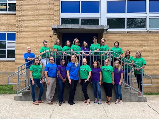 Red Clay staff poses for a photo. 