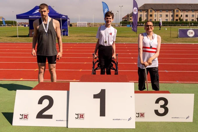 Photo of the Men’s Frame Running 100m medal ceremony at the Scottish Championships yesterday. I’m in the middle (Gold), Ed is on my right (silver) and Ross to my left (bronze)