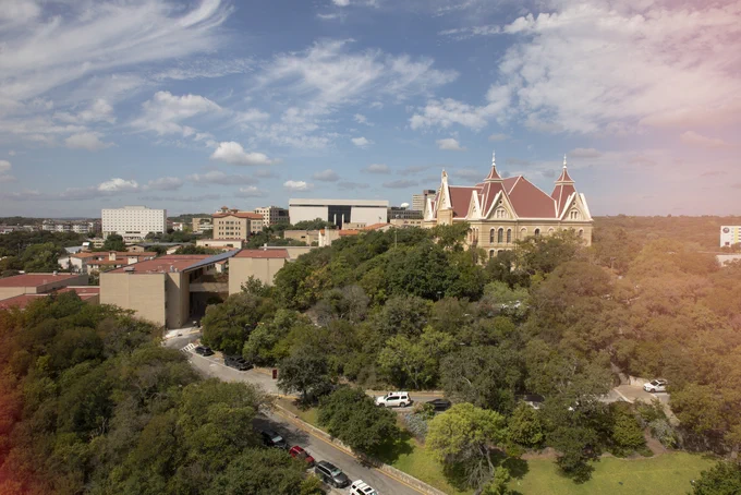 Texas State University campus view with Old Main, Alkek Library and Tower Res Hall in view.