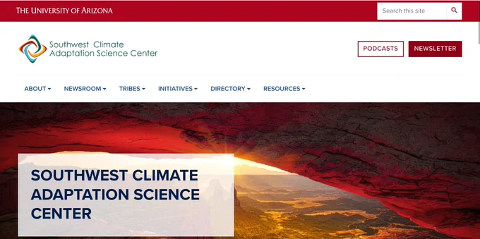 Red and white website home page of Southwest Climate Adaptation Science Center at the University of Arizona. There are tabs for 'About' 'Newsroom' 'Tribes' 'Initiatives' 'Directory' and 'Resources'. In the upper right corner there is a search box and buttons to listen to the SW CASC podcast or read the newsletter. 