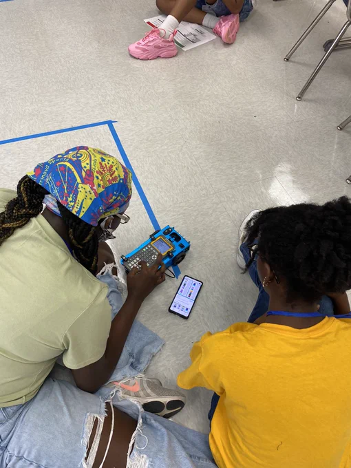 Students coding the rover with RGB colors