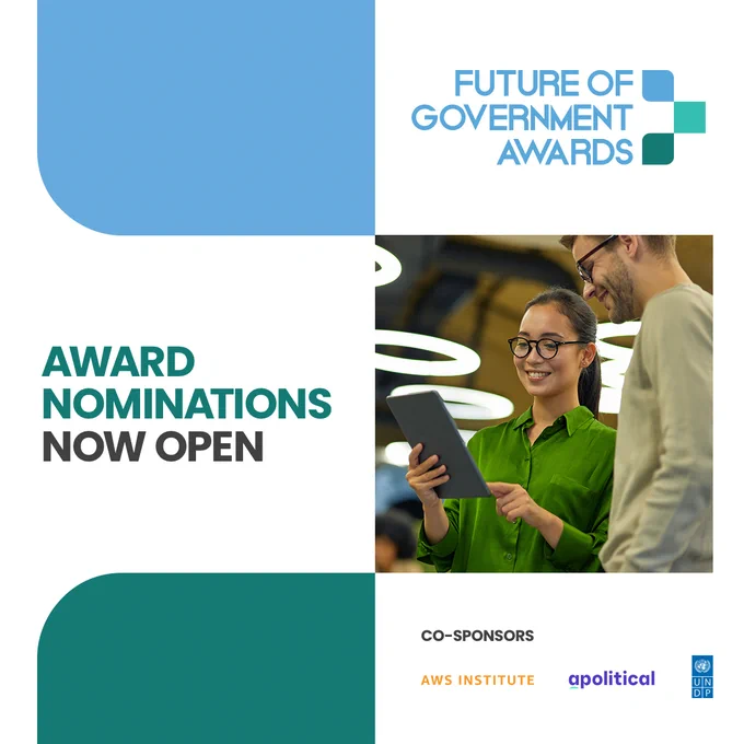 A banner with the text 'Award Nominations Now Open' for the Future of Government Awards - a collaboration between Amazon Web Services, Apolitical, and UNDP. It has a photo of a woman holding a computer tablet, with a male colleague standing next to her also looking at the screen.