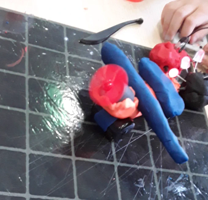 Picture of a play doh  plane with spinning propeller and lights
