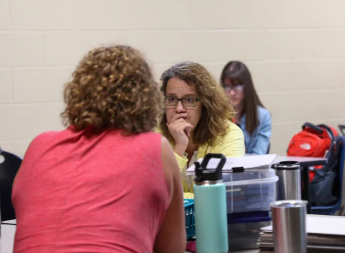 two teachers talking