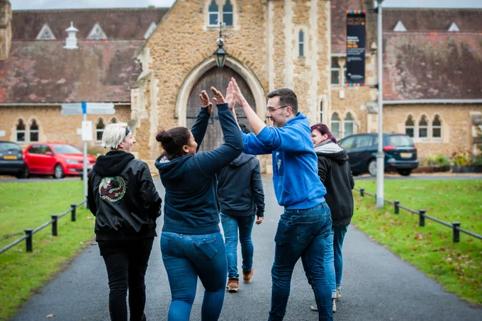 Students high fiving
