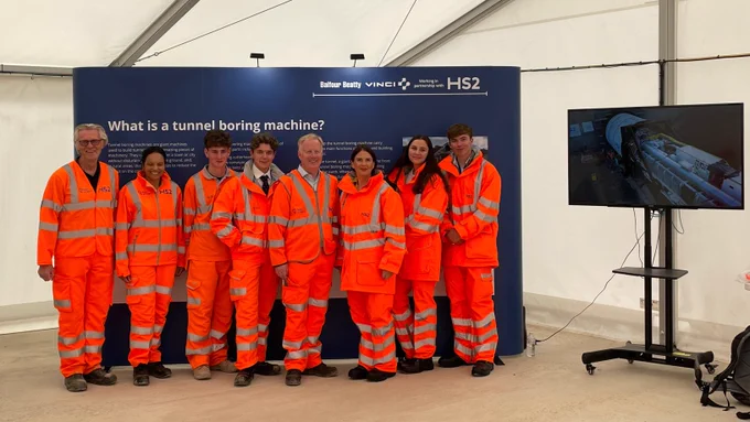 Minister Harrison takes a group photo with HS2 employees and students.