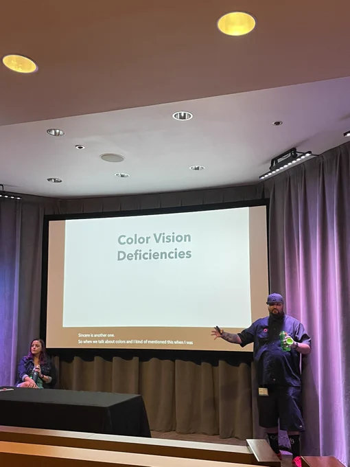 Chris DeMars and Cassandra Faris speaking about color accessibility at Code PaLOUsa