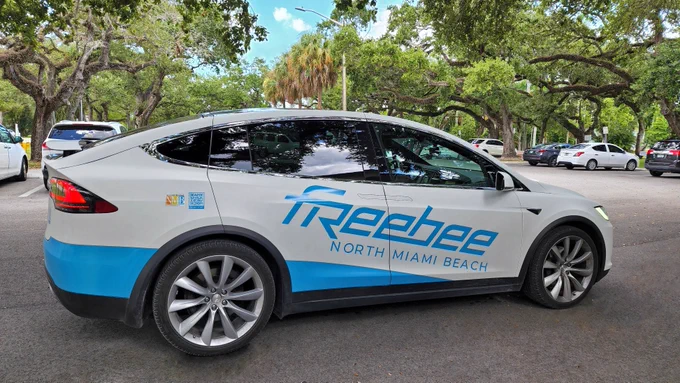 A City of North Miami Beach Freebee Tesla vehicle outside the Ancient Spanish Monastery in North Miami Beach, Florida.