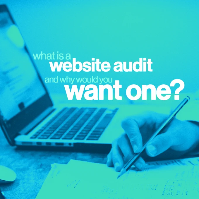 Person sketching on paper with a laptop in background. Text says, "What is a website audit and why would you want one?"