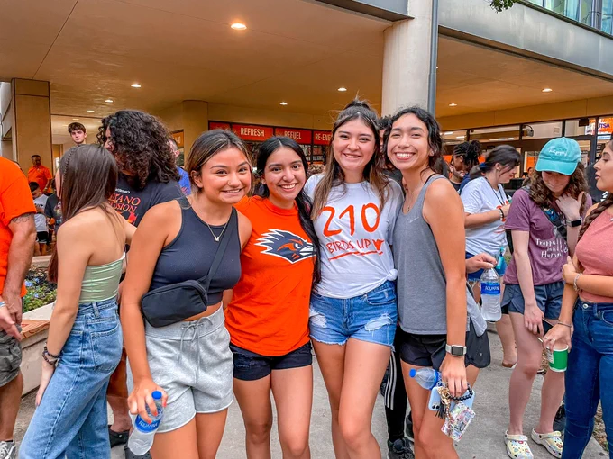Four friends show their spirit at Spirit of San Antonio celebration.
