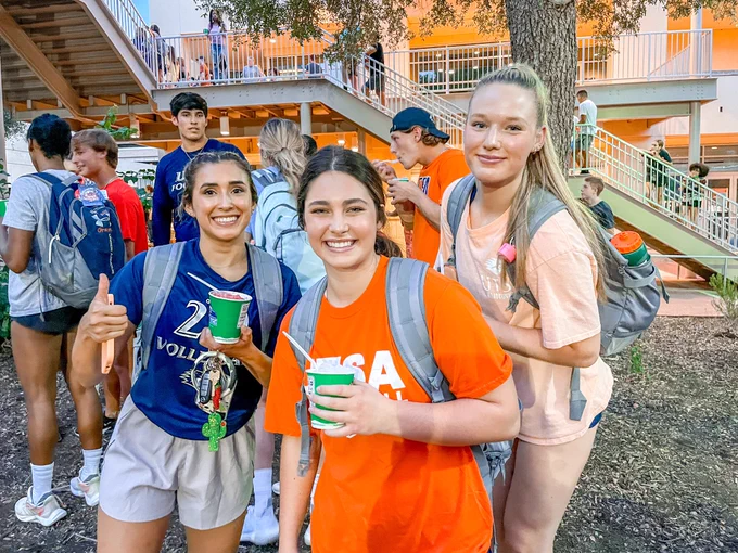 Three friends stay cool and in the UTSA spirit at the Roadrunner Welcome.