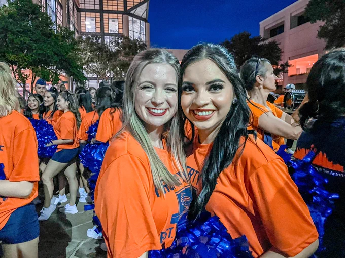 Friends enjoy a hug after an awesome performance during Roadrunner Welcome.