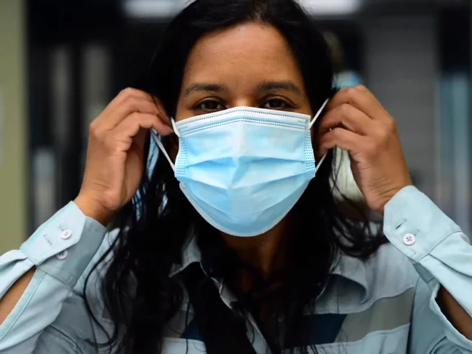 A picture of a member of LGT staff wearing a mask