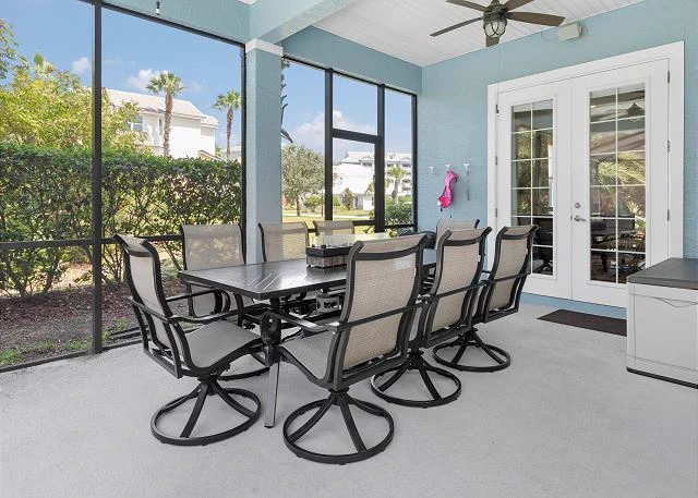 The covered and screened in lanai is huge with over 1,000 square feet of space to play games, grill or share vacation memories. ID 216063 OwnerDirect.com