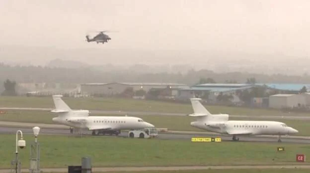 Two identical private jets at Aberdeen airport