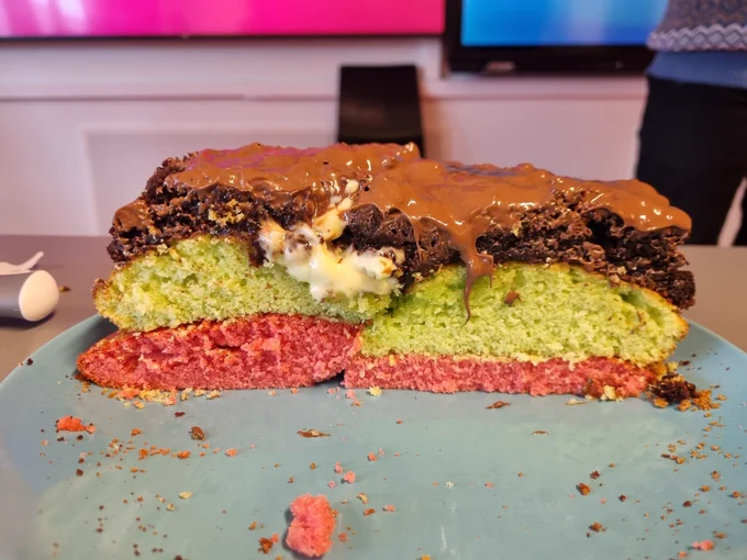 Cake with offset layers and blob of cream inside