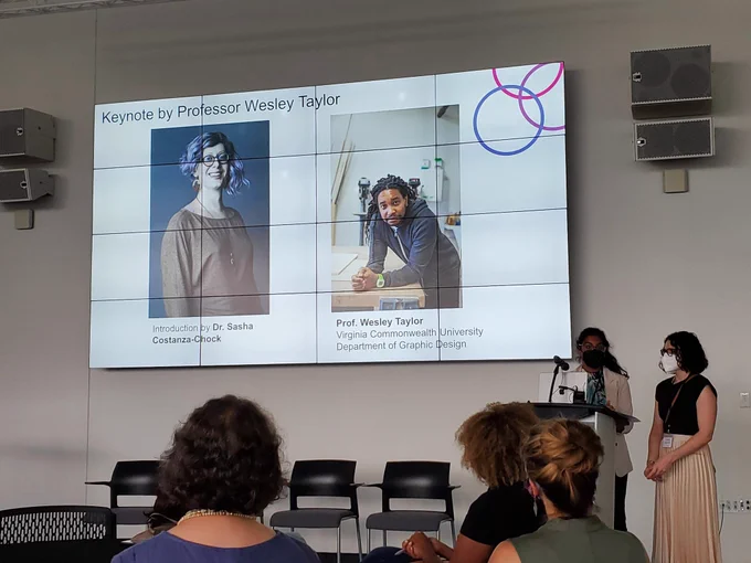 Rima Das and Anastasia Ostrowski welcomes the crowd at the Design Justice Summit.